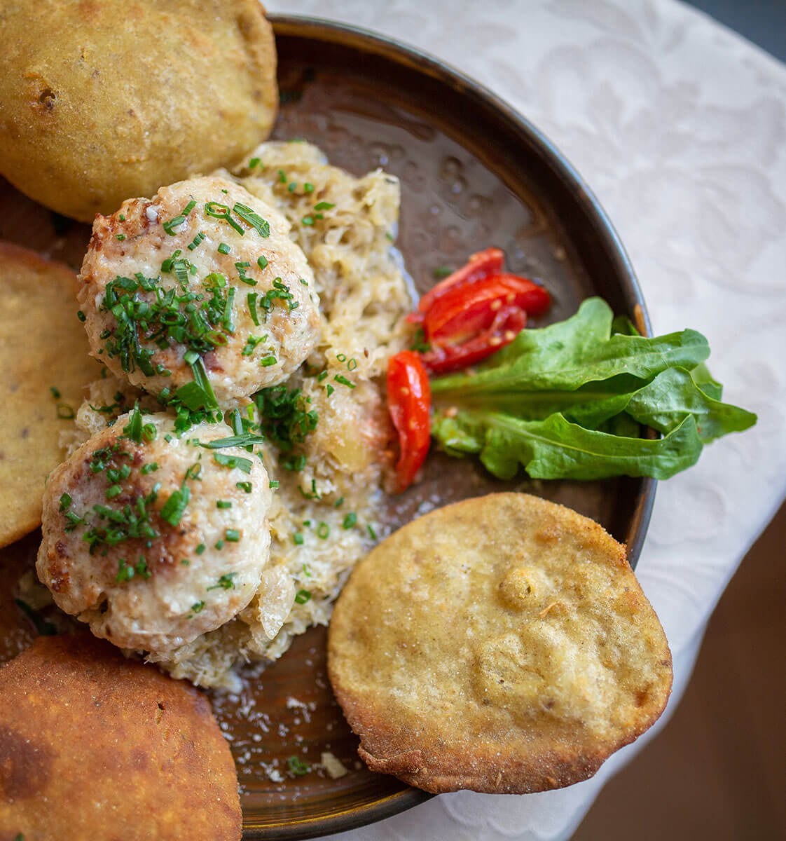 Delizie culinarie - dettaglio - patate e canederli - Hotel Amaten